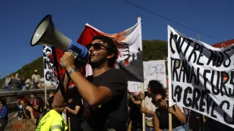 Countrywide Protests Break Out Against Spending Reductions
